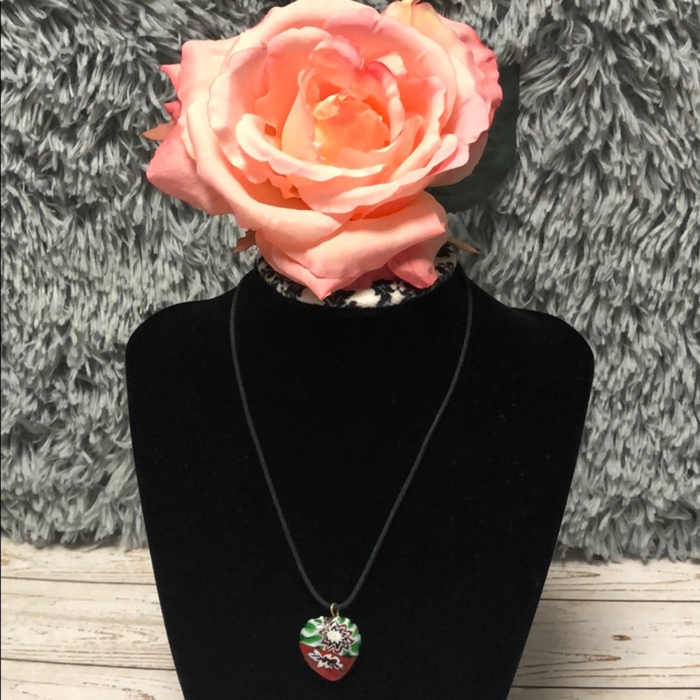 necklace with painted heart shaped stone